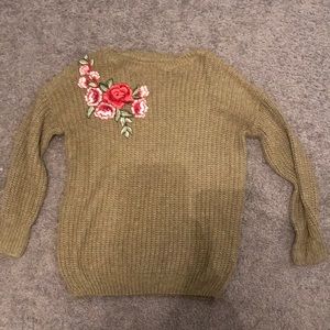 Green embroidered sweater